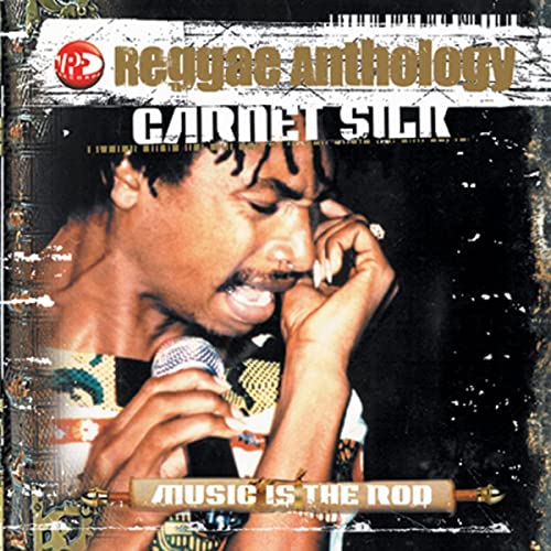 Reggae album cover featuring Garnett Silk with microphone, titled "Music Is The Rod.