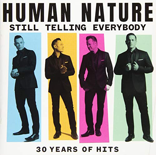 Human Nature CD cover featuring four band members in suits.