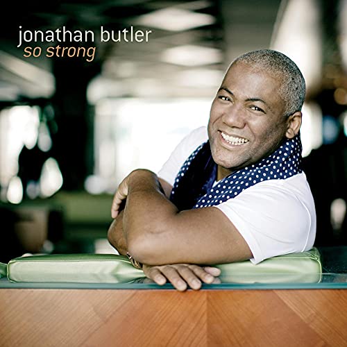 CD cover featuring Jonathan Butler smiling, wearing a white shirt and blue scarf.