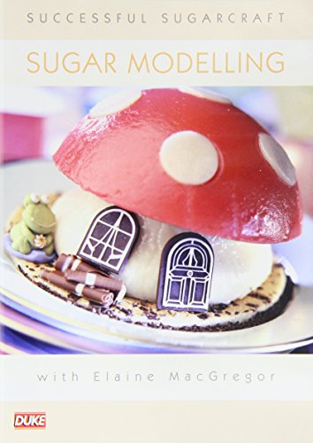 DVD cover featuring a red mushroom and sugarcraft house decoration.