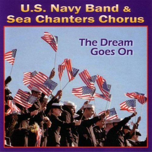 U.S. Navy band and chorus with waving American flags.