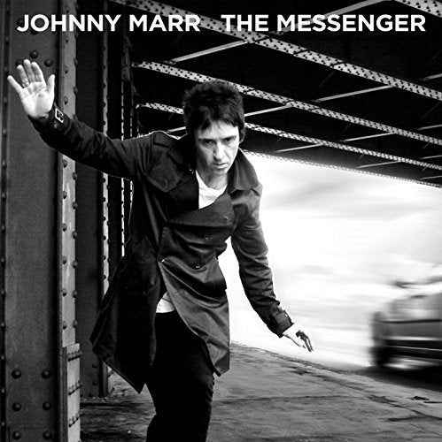 Johnny Marr album cover: man in coat walking under a bridge.
