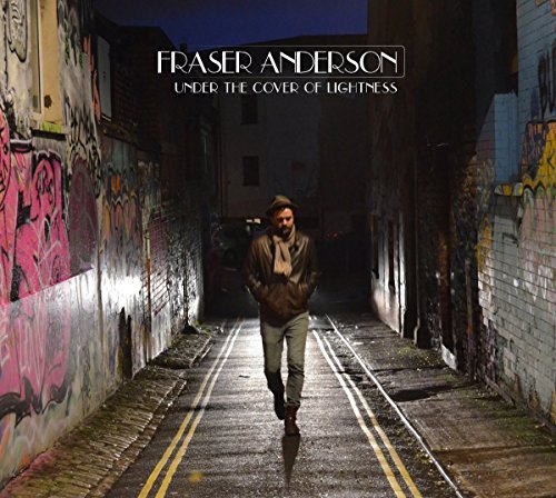 CD cover: man walking down a graffiti-lined alley at night.