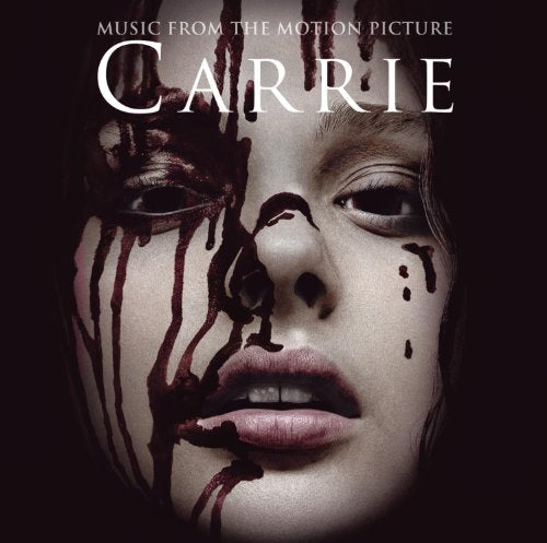CD cover for “Carrie” featuring a young woman with blood-like streaks.