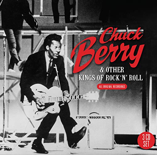 Chuck Berry album cover, black and white photo of him playing guitar.