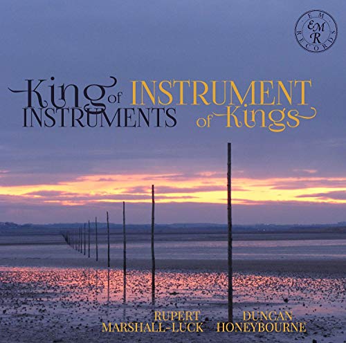 CD cover with sunset over a mudflat and wooden posts.