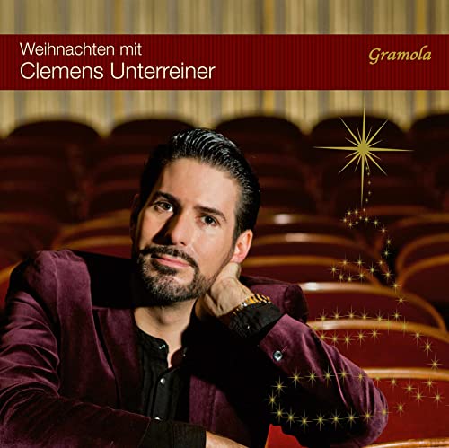 Clemens Unterreiner album cover with a portrait and festive starburst.