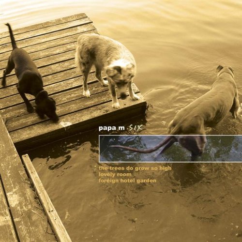 CD cover with three dogs on a wooden dock over water.