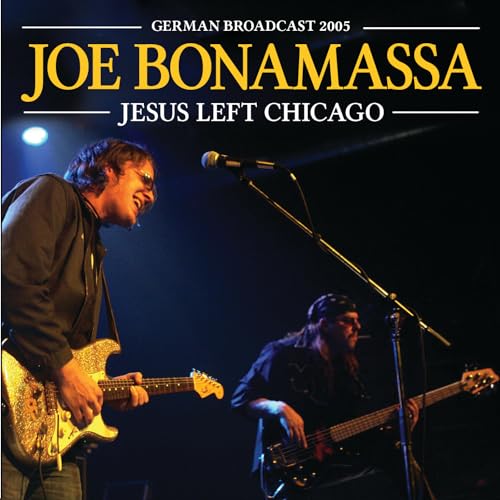 Joe Bonamassa performing with a guitarist on stage, album cover.