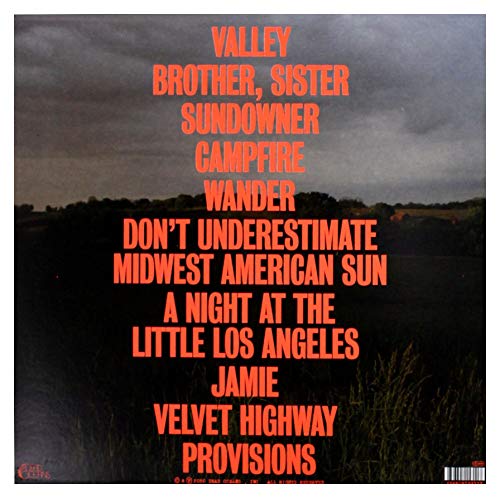 Vinyl record cover for Kevin Morby’s “Sundowner” with orange text on a dark landscape.