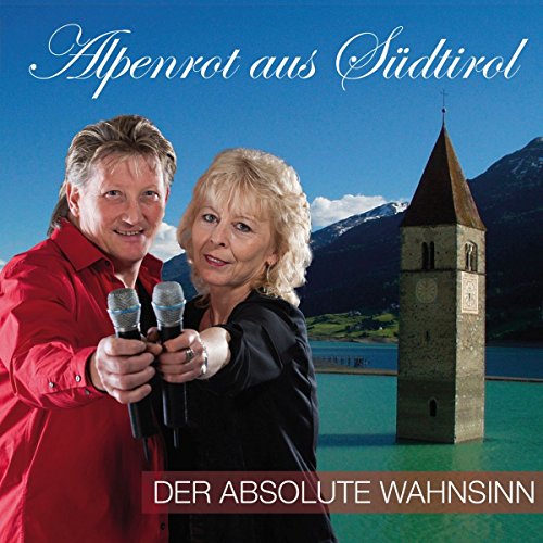 CD cover featuring a couple with microphones and a church tower.