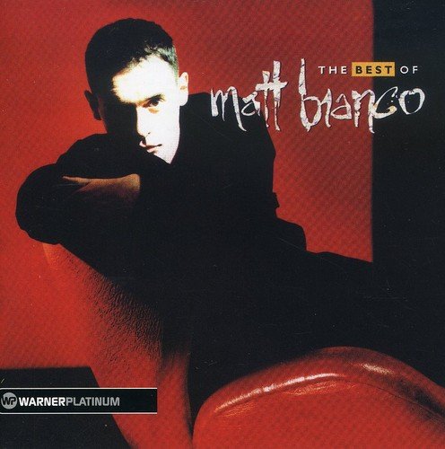 Matt Bianco album cover featuring a portrait of the singer on red background.