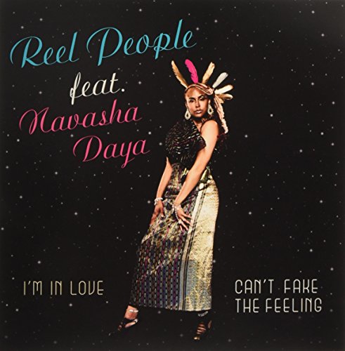 Vinyl record cover featuring Navasha Daya in feathered headdress against stars.