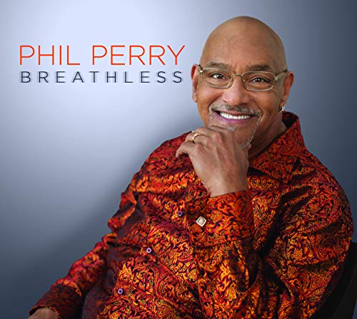 Phil Perry album cover: smiling man in a patterned shirt.