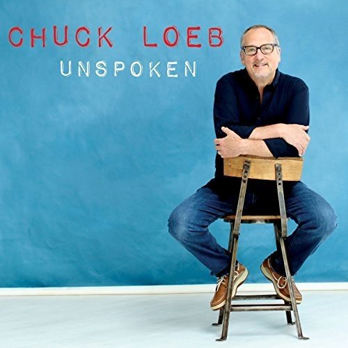 Album cover for Chuck Loeb’s “Unspoken” featuring a man on a stool.