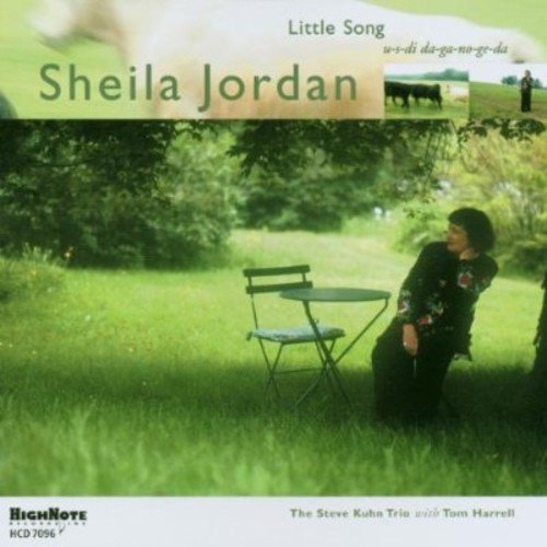 CD cover: Sheila Jordan seated in a green garden, cows in distance.