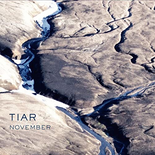 CD cover for Tiar’s “November” featuring a wintry, aerial landscape.