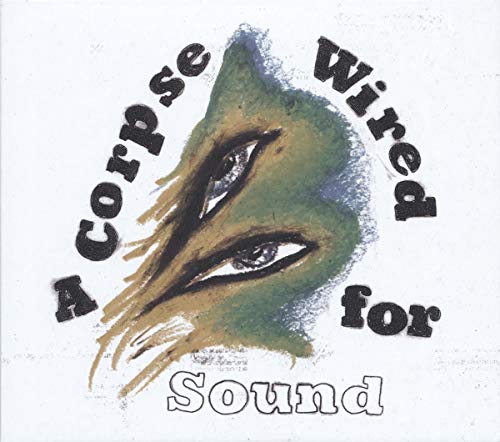 CD cover: painted eyes and text arranged in a circular design.