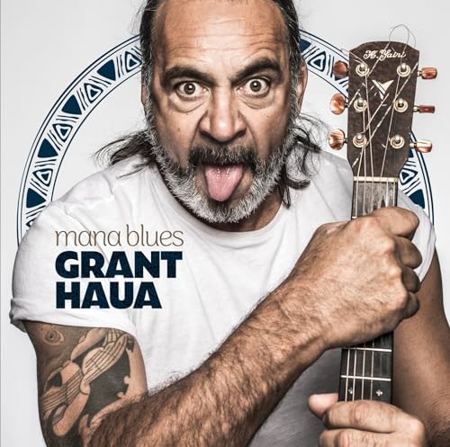Grant Haua album cover with artist holding an acoustic guitar.