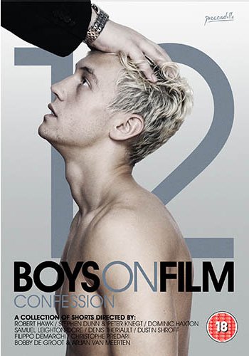 A hand rests on the head of a shirtless man against a number twelve background.