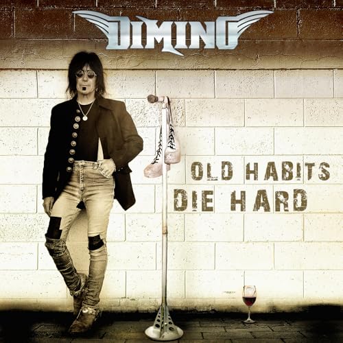 Album cover for Dimino’s “Old Habits Die Hard” featuring a musician and sneakers.