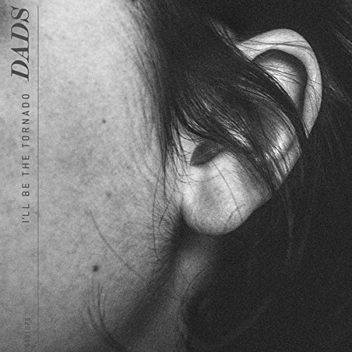 Black and white album cover featuring a close-up of a person’s ear and face.