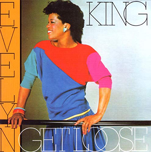 Evelyn King album cover, portrait of a smiling woman in colorful clothing.