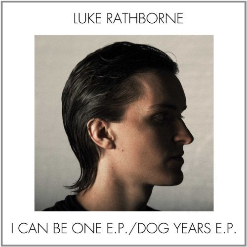 Album cover for Luke Rathborne’s “Dog Years,” featuring a portrait of a man.