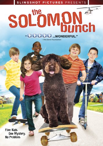 DVD cover featuring five children and a brown poodle with a skateboard.