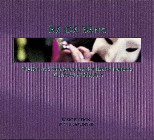 Purple CD cover with masked figures playing instruments, titled "Ra Da Bang".