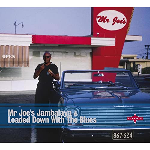 CD cover: man with classic car in front of diner.