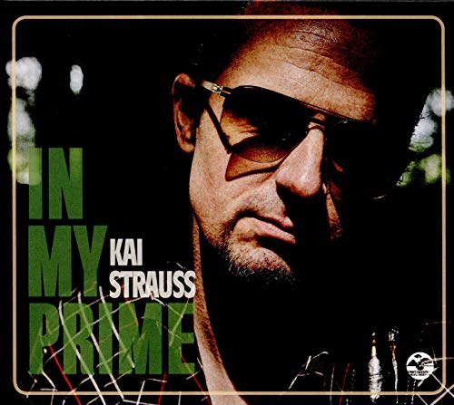 CD cover: Kai Strauss portrait with sunglasses and bold green text.
