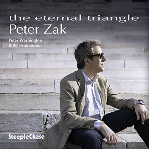 CD cover featuring Peter Zak, a man in a suit, sitting on steps.