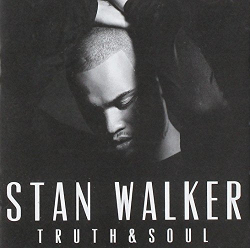 Black and white album cover featuring Stan Walker looking downward.