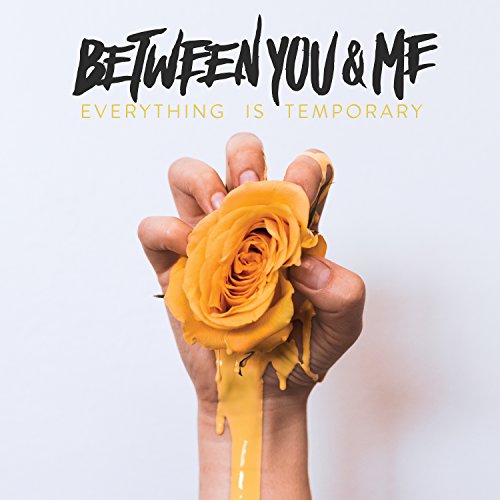 CD cover: hand holding a dripping yellow rose, text reads "Between You & Me".