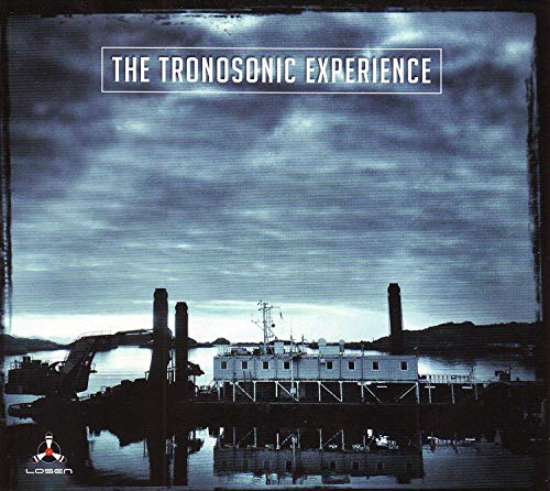 CD cover with industrial landscape and stormy blue sky.