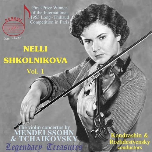 Black and white portrait of violinist Nelli Shkolnikova with her instrument.
