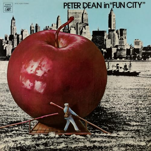 Red vinyl record cover featuring a giant apple and city skyline.