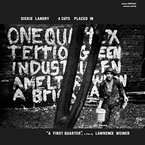 Vinyl album cover featuring graffiti and a young boy with a bucket.