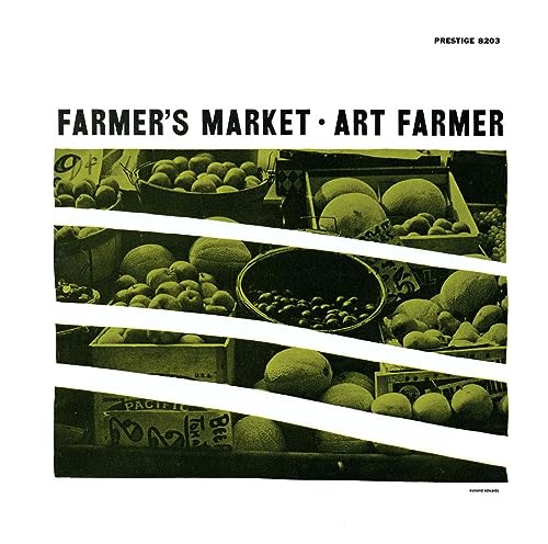 CD cover with a monochrome image of fruit at a market.