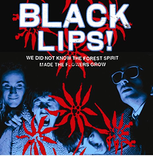 CD cover with three people, red flower, and bold text.