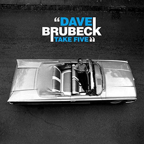 Dave Brubeck's "Take Five" vinyl cover with a man and classic car.
