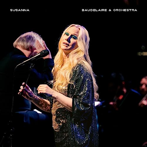 Susanna performing with an orchestra, album cover with a blonde singer.