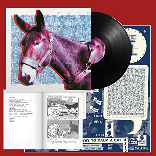 Vinyl record, album cover featuring a mule, lyric booklet, and printed insert on red.