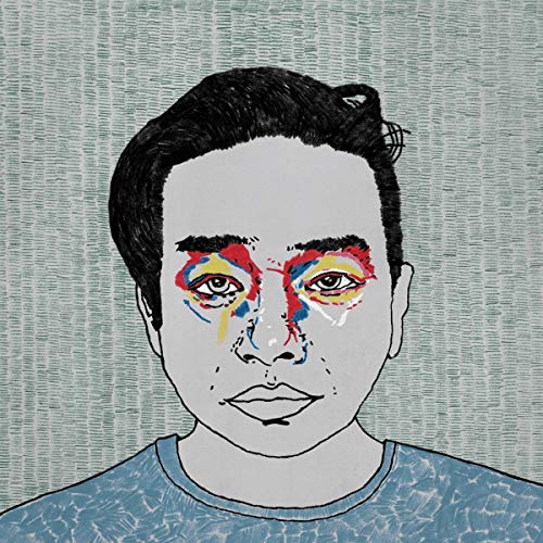 Black and white portrait of a man with colorful paint around his eyes.