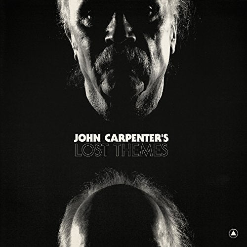 Close-up of John Carpenter’s face with album title “Lost Themes” below.
