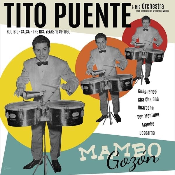 Tito Puente album cover, featuring a musician playing timbales in a suit.