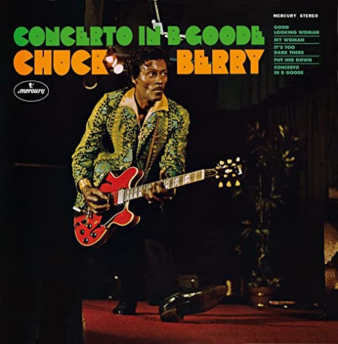 Chuck Berry playing a red electric guitar on a record album cover.