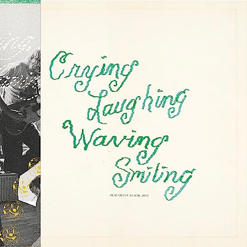 Vinyl record cover with green cursive text and a partial dog illustration.
