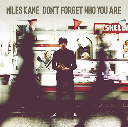Album cover for Miles Kane’s “Don’t Forget Who You Are” featuring a man in a suit.